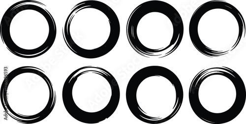 Hand drawn black ink brush circles set on white background vector designs