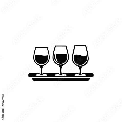 Three wine glasses on a tray drink beverage