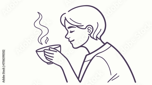 A person enjoying the aroma of a steaming hot beverage in a cup.