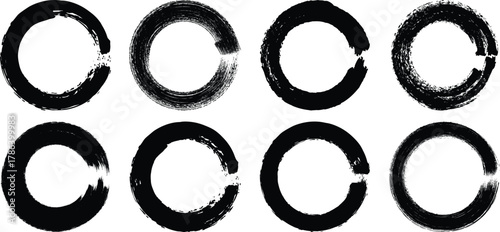 Set of eight grungy oval frames with distressed edges in black isolated on transparent background