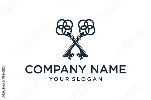 Stylized Crossed Keys Logo Design with Abstract Intertwined Circular Bows