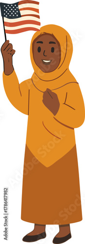 Smiling woman in a yellow-orange outfit and hijab holding and waving an American flag with pride and joy.