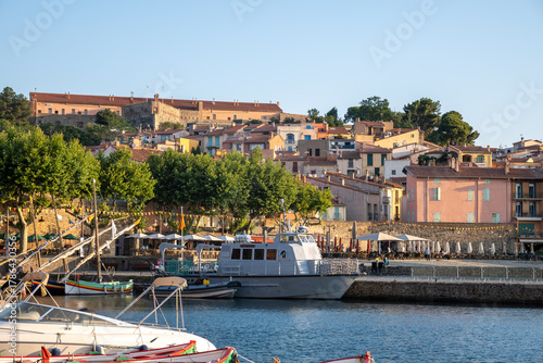 Fototapeta Naklejka Na Ścianę i Meble -  View of colourful Collioure, narrow streets and yellow, pink, orange houses, summer vacation destination town with historical buidings and beaches, Pyrenees-Orientales, France