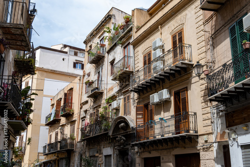 View of streets of Palermo, citylife, ancient baroque churches, old narrow streets, Norman palaces, markets, Sicilian vacation destination, South of Italy