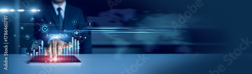 Businessman using tablet analyzing e-commerce trends and growth graph chart, online retail analytics, digital sales performance, market demand, business strategy, global shopping data insights.