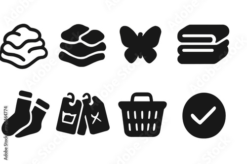 Laundry Sorting Icons. Laundry sorting. Filled icon set of laundry sorting: white clothes pile, colored