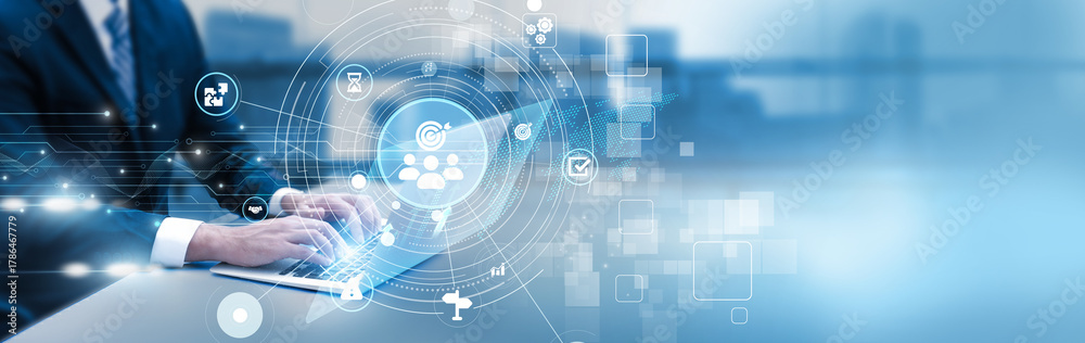 Naklejka premium Team leader analyzing project management dashboard on laptop, task tracking, milestone progress, and workflow efficiency analytics.