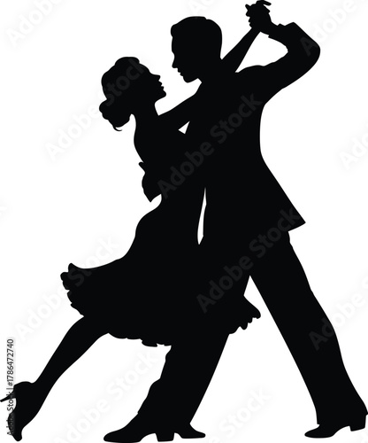 Silhouette of couple performing elegant tango