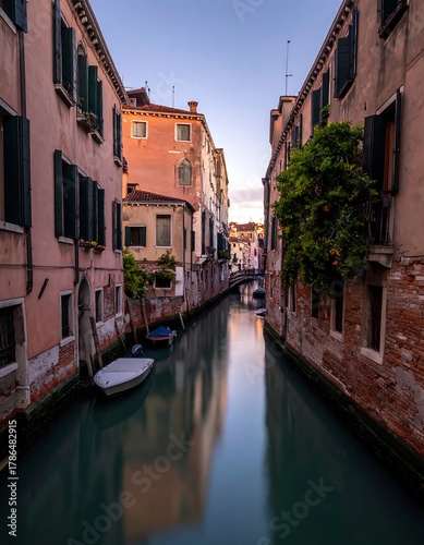 Venetian canal view with aged buildings and a small boat at dusk