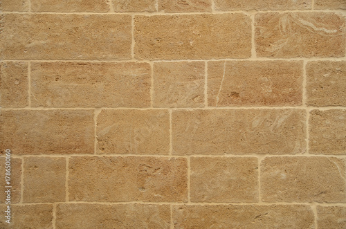 New yellow stone wall  closeup in Lecce, Italy