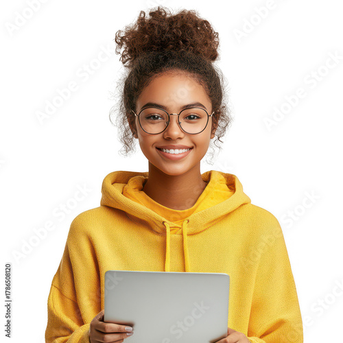 Studio portrait of smiling african american teen girl, online course or high school student holding laptop isolated on white transparent background