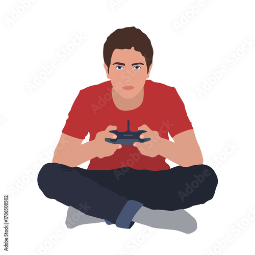 Young man playing video game sitting cross legged
