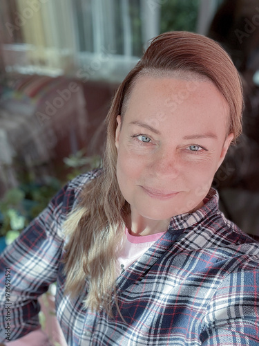 portrait of a woman with long blonde hair