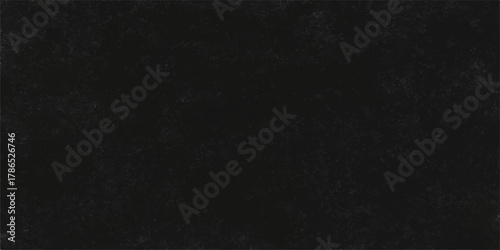 Dark black and white grunge texture pattern on rough surface paper background