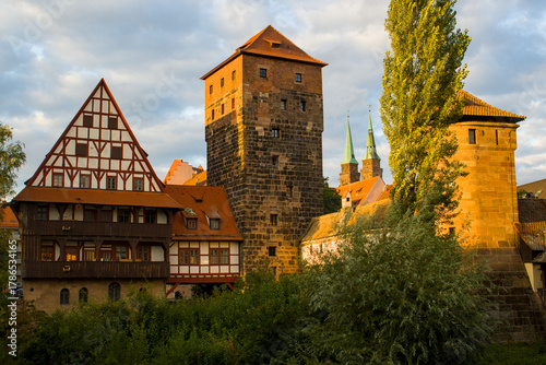 Photos Light slides over old towers and half timbered houses in Nurnberg Germany