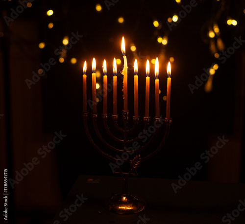 Hanukkah Menorah with Burning Candles and Warm Lights