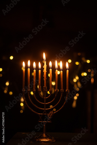 Hanukkah Menorah with Burning Candles and Warm Lights