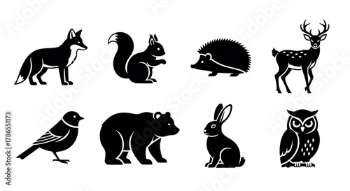 Collection of black silhouetted animal icons featuring a fox, squirrel, hedgehog, deer, bird, bear, rabbit, and owl, each distinctly posed.