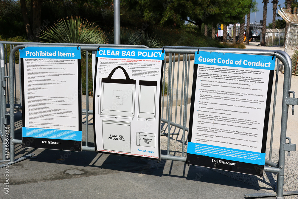 Fototapeta premium Inglewood, California – October 24, 2025: SoFi Stadium – Prohibited Items, Clear Bag Policy and Guest Code of Conduct Signs