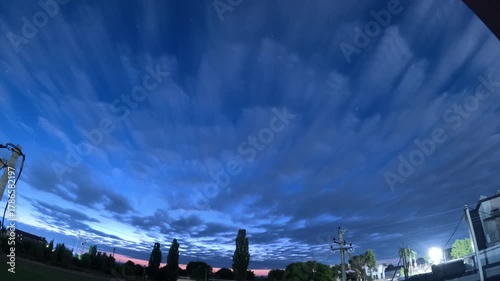 Night to day. Time lapse of starry night, galaxy stars moving 