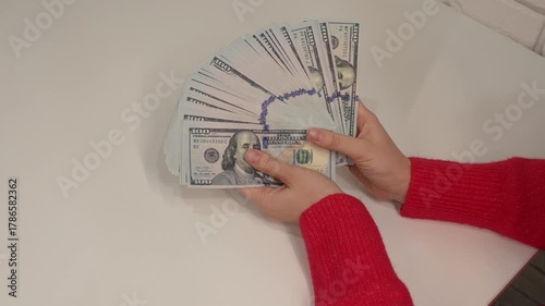 Close up video of woman counting money at the table. Business, finance, economy, deal, earnings, expenses. 