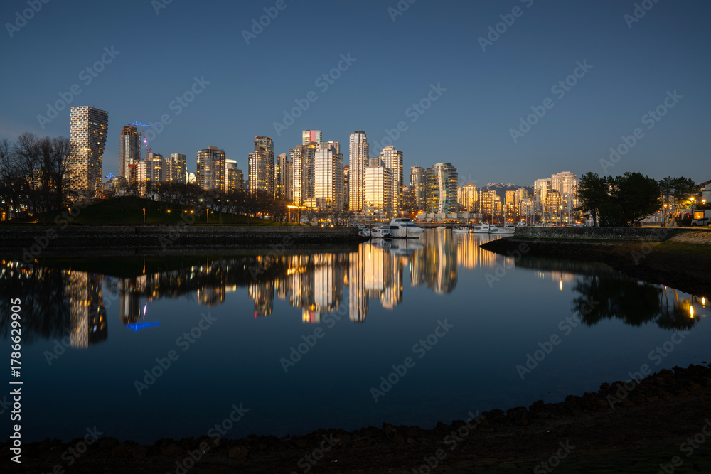 Naklejka premium False Creek Twilight Yaletown Skyline. A False Creek twilight reflections in Vancouver. British Columbia, Canada. 