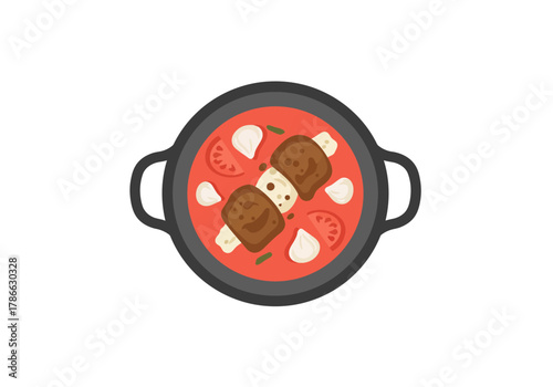 Topdown view of a dark pot filled with red stew meatballs and white vegetable pieces