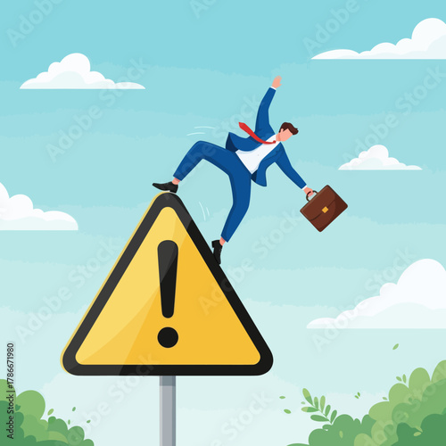 Business risk or problem warning concept. Businessman Slipping on a Warning Sign in a Risky Scenario