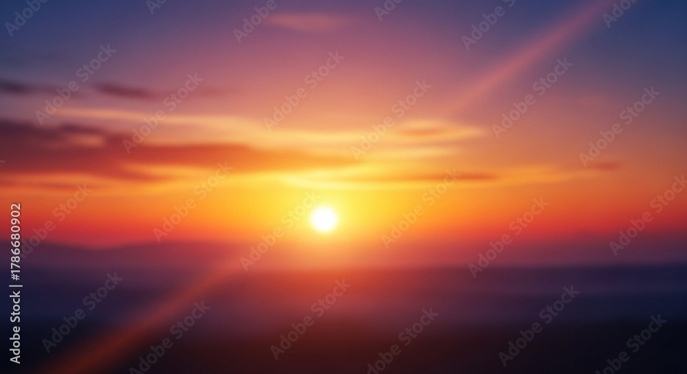 Obraz premium Vivid sunset gradient with soft glowing haze, dreamy blur layers, and faint light beams