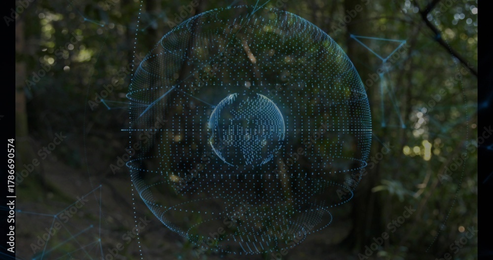 Fototapeta premium Floating blue holographic sphere rotating over forest clearing, with inner globe and network nodes