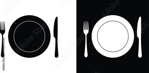 Inverted color plate setting featuring a fork and knife shows restaurant preparation