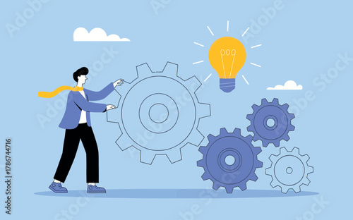 Business person activating gears in a system for teamwork success and innovative project development concept