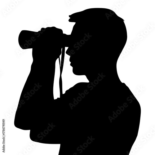 silhouette of a person using binoculars