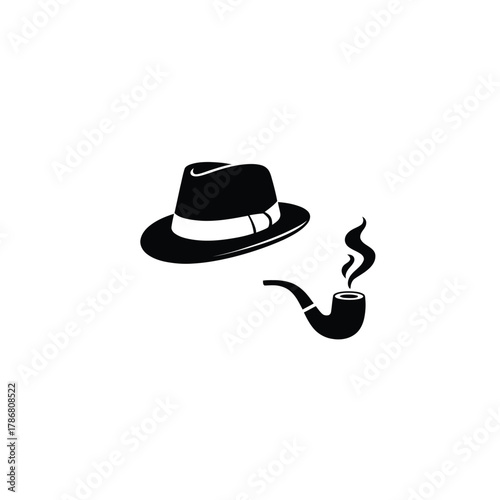 Vintage fedora hat and smoking pipe with smoke