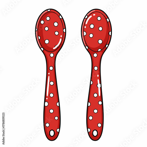 Two red spoons with white polka dots sitting side by side. Red spoons are essential for cooking and baking. Red spoons add a whimsical touch to kitchenware,