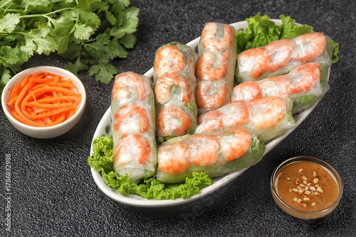 Gỏi cuốn, Vietnamese spring rolls, summer spring rolls, or salad spring rolls, a traditional dish in Vietnamese cuisine consisting of chicken, shrimp, vegetables, bún, and other ingredients wrapped in