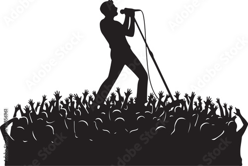  Dynamic silhouette of a male singer performing live on stage to an enthusiastic crowd, concert or music event concept