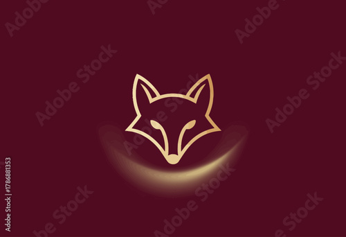 This logo features a stylized golden fox head against a deep maroon background, embodying a sense of elegance and sophistication in minimalist design.