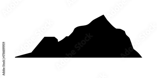 Silhouette of a mountain range against a, featuring jagged peaks and varying elevations