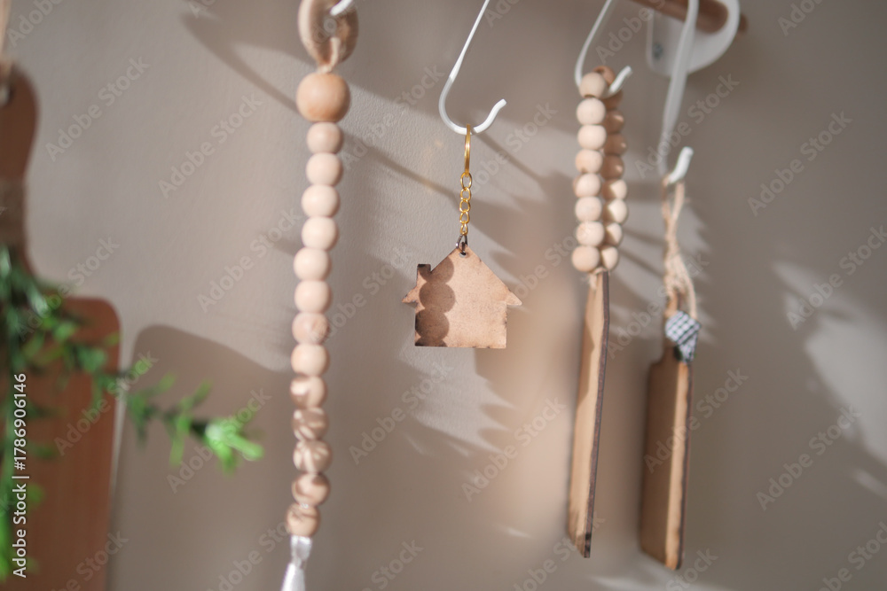 Fototapeta premium Wooden home charm hanging in a sunny kitchen space