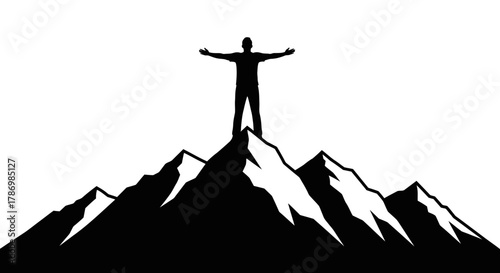 Silhouette of successful man atop mountain peak celebrating victory
