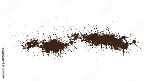 Dynamic brown ink splatters and paint blots on a clean background