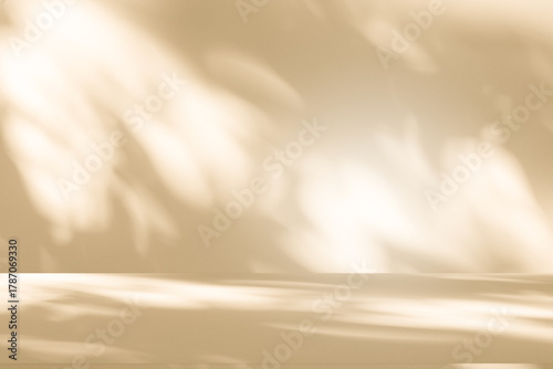 Wall interior autumn background, studio, and backdrops show products. with shadow leaf color beige background for text insertion and presentation of product	