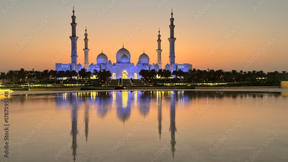 Fototapeta premium blue mosque at sunset Abu Dhabi Sheik Zayed Mosque | Beautiful islamic architecture | The mosque is located in the capital city of the United Arab Emirates | Tourist attr