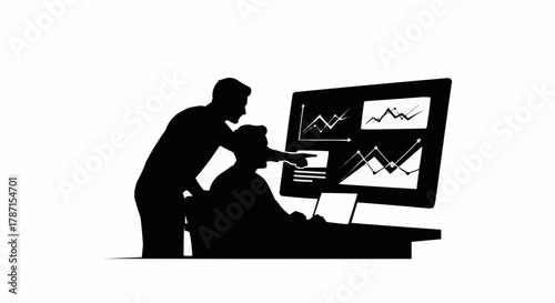 Two people analyzing financial data on a computer screen together.