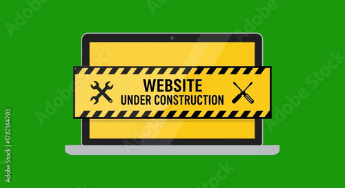 Website under construction notice on laptop screen for maintenance work