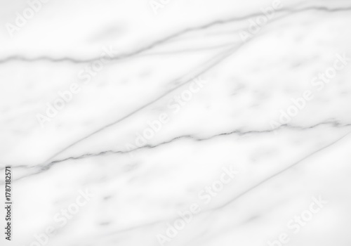 High-resolution texture of bright white marble with delicate, elegant gray diagonal veining throughout the surface