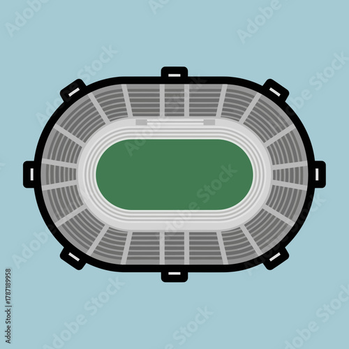 Aerial view of an empty sports stadium with green field and seating.