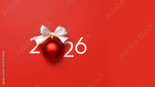 An unusual inscription 2024 with a Christmas ball. A symbol of t