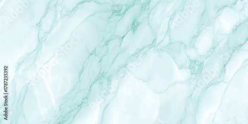 Soft blue marble quartz stone texture background with turquoise and cyan veins and light white areas, elegant natural pattern.